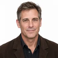 Andrew Ross desk portrait